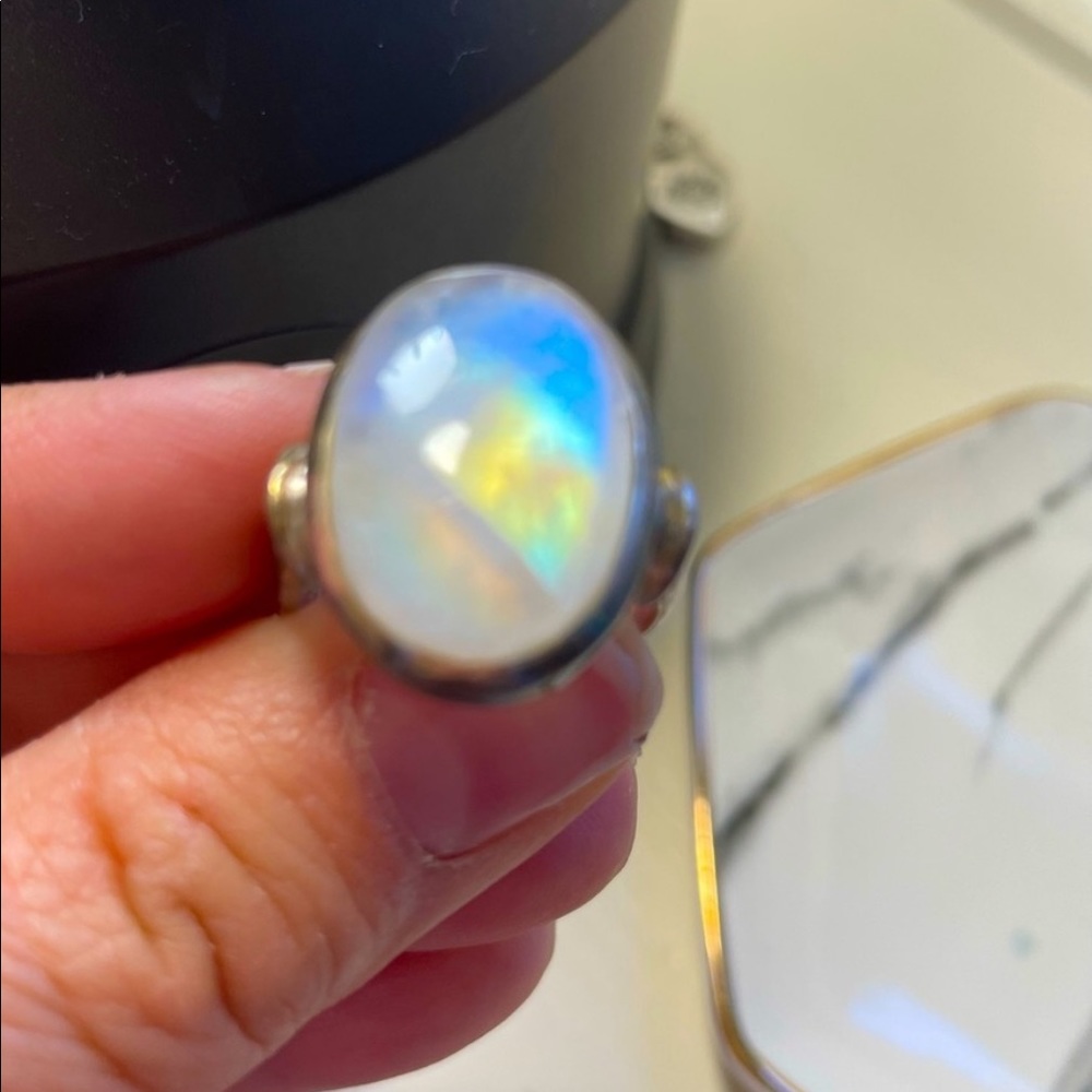 Authentic, rare real Moonstone, placed into a
sterling silver ring. Size 9-10W
